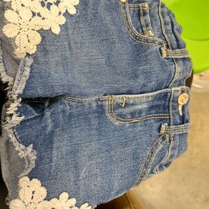 Jordache Blue Jeans with White Floral Details